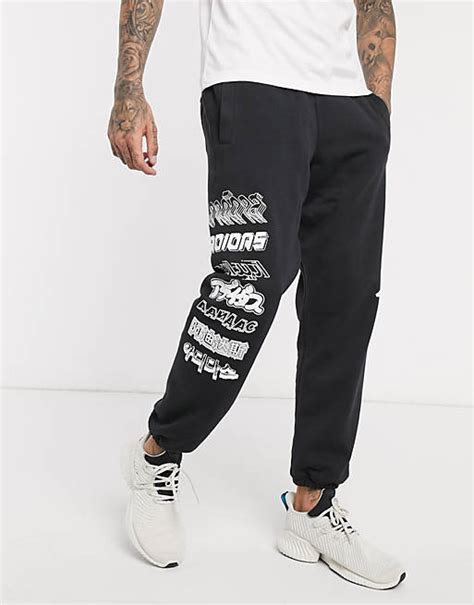 Adidas Woven Joggers In Black With Side Print Asos