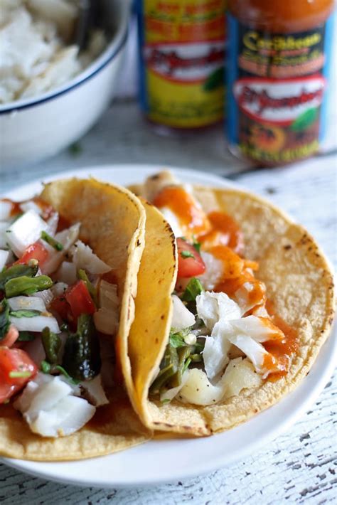 Pico de gallo is a simple salsa made with raw chopped tomato, onion, jalapeño, or serrano chile and cilantro. Fish Tacos with Poblano Pepper Pico de Gallo » The Thirsty ...