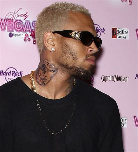 Chris brown has been relatively quiet on the tattoo front these days, but the controversial singer is back in business now, having just. Chris Brown reveals new tattoo of a 'beaten woman'... but ...