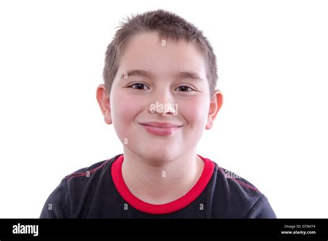 Head And Shoulders Close Up Portrait Of Young Boy Wearing Red And Black