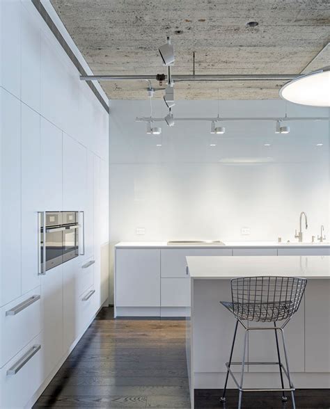 This trend isn't for every kitchen, but more minimalist and industrial kitchen designs are opting for the. Kitchen Design Idea - White, Modern and Minimalist ...