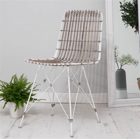 This dining room set enchants with its lightness and warmth. rattan scandi style dining chair three colours by za za ...