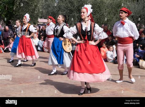 Folk Dancers Of Nice France Performing A Traditional Dance Of The