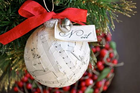 To make, i gathered up my strands of yarn, some balloons, and a variety of glue sources we had so as you wrap, be sure to wrap your glue soaked yarn around your balloon and leave it at that. 10 Beautiful Sheet Music Christmas Ornaments You Can Make Yourself