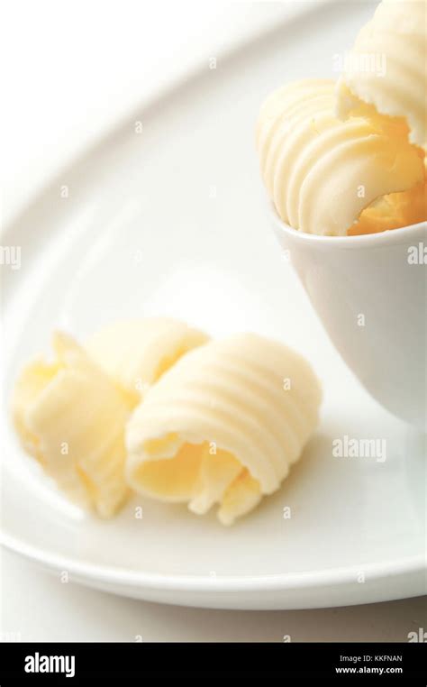 Fresh Butter Curls In Dish Stock Photo Alamy