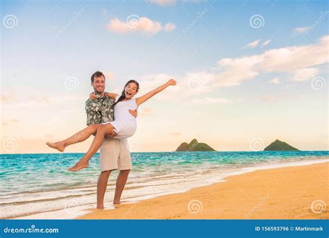Happy Honeymoon Couple On Beach Wedding Vacation Newlyweds Excited In Hawaii Travel Destination