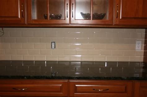 Although that is an important function, and the fact that having a kitchen backsplash makes the backsplash areas so easy to clean is fantastic. cherry+cabinets+with+subway+tile+backspash | Show me your ...