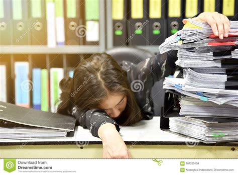 Asian Worker Woman Sleeping On The Workplace Tired Woman Asleep From
