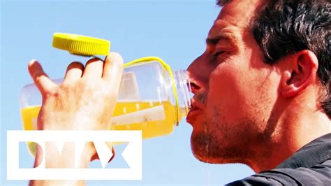 bear grylls drinks urine to show how to survive the desert bear grylls escape from hell youtube