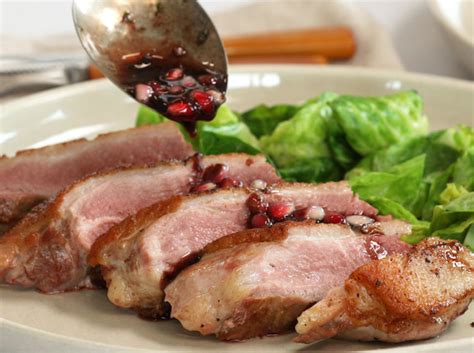 seared duck breast with pomegranate reduction bell and evans