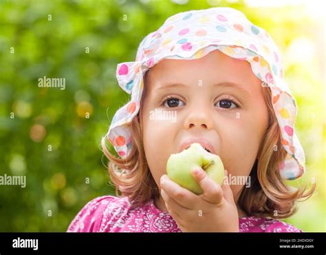 Girl Eating Apple Girls Eat Apples Stock Photo Alamy