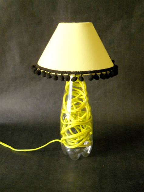 Children in the area collect plastic bottles for him and his aunt brings him offcuts of fabric from the. Plastic Bottle Lamp • Recyclart