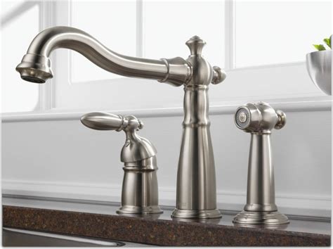Remove the sprayer flex line from the faucet body from underneath the sink. Delta Faucet Victorian Single-Handle Kitchen Sink Faucet ...