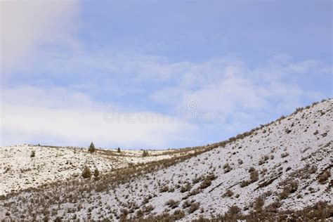 Snowy Hill Ridge Under Blue Skies Clouds Stock Photos Free And Royalty