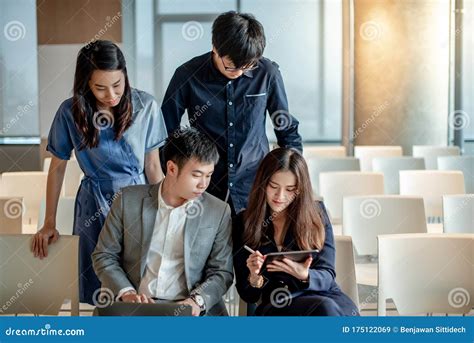 Asian Colleagues Discussing In Conference Room Stock Image Image Of