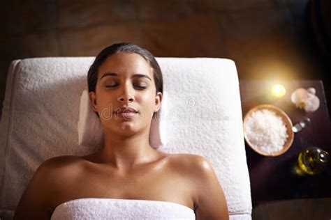 This Is Bliss A Beautiful Young Woman Relaxing During A Spa Treatment Stock Image Image Of