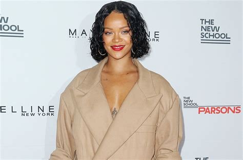 Rihanna Responds To Body Shamers With Gucci Mane Meme Billboard