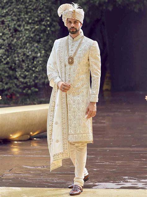cream colour designer sherwani for groom made from the finest fabric will make you feel like a