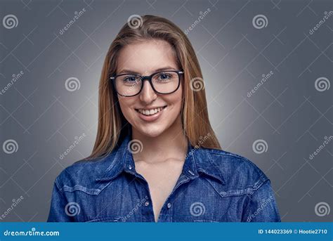 Attractive Stylish Blond Woman Wearing Glasses Wearing Glasses Smiling At The Camera Stock Image