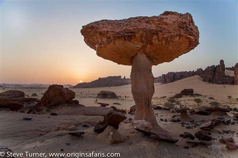 Sunrise Over The Spectacular Ennedi Plateau Rising From The Sands Of