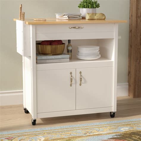 Keep your kitchen area clean and organized with this rolling kitchen trolley. August Grove Allie Kitchen Cart with Wood & Reviews | Wayfair.ca