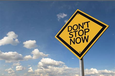 Dont Stop Now Yellow Highway Road Sign Stock Photo Download Image Now