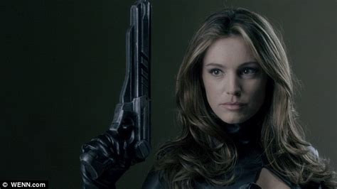 A Leather Clad Kelly Brook Sizzles As A Gun Toting Superhero In New French Sci Fi Show Metal
