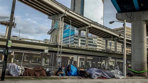County Has Problems With Miamis Homeless Plan On Island Miami Herald