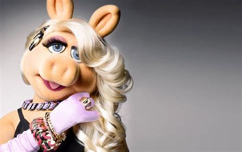 The Miss Piggy Is Posing For A Photo