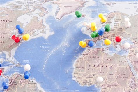 Image Of Colorful Pins Locating Destinations On World Map Freebie