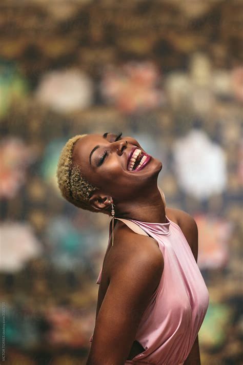 Young Cheerful Gorgeous Black Woman Laughing by VICTOR TORRES - Black