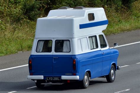 Live life at the drop of a hat. 1972 Ford Transit Campervan | Rear view shot of this ...