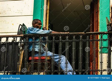 Havana Cuba â€ 2019 Old Cuban Relaxing At His Balcony Editorial