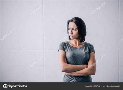 Depressed Brunette Woman Crossed Arms Home — Stock Photo © Haydmitriy