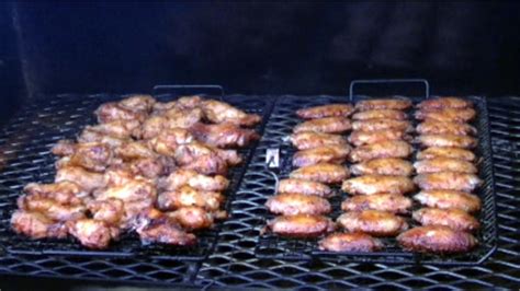Chicken wings are great for any occasion. SmokingPit.com - Yoder YS640 Pecan & Cherry Smoked Tiger Sauced Chicken Party Wings with a ...