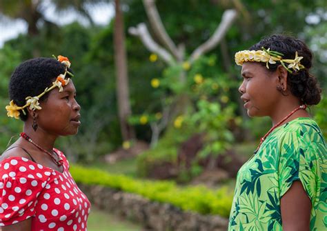 Two Women With Floral Garlands Chatting Milne Bay Province Trobriand