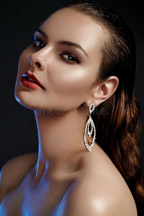 Beautiful Woman In Luxury Fashion Earrings Diamond Shiny Jewelry With