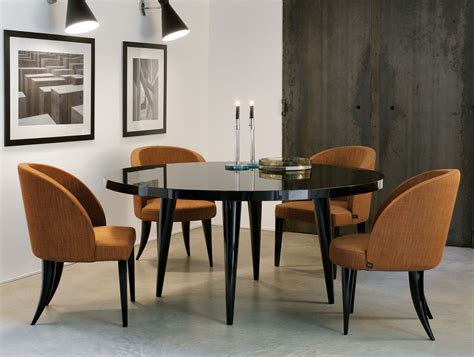 Despite having the same function, the modern dinner table has better characteristics and style of a traditional dinner table. Nella Vetrina Elle Modern Italian Round Lacquered Wood ...