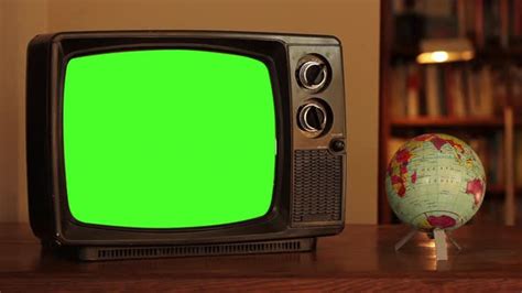 Old Tv Set With Green Screen And Terrestrial Globe 4k Version Stock