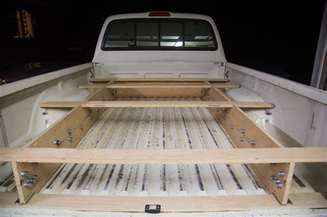 Take the table saw to rip one sheet of plywood to the measurements of dimensions for the vertical dividers from the rough design sketch. Adventure Truck Retrofitted a Toyota Tacoma with a bed and ...