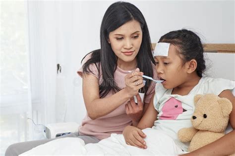 Asian Mother Take Care Sick Daughter On Bed Stock Photo Image Of