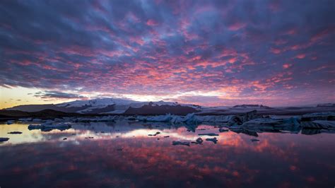 Download 1366x768 Wallpaper Glacier Sea Mountains Nature Sunset