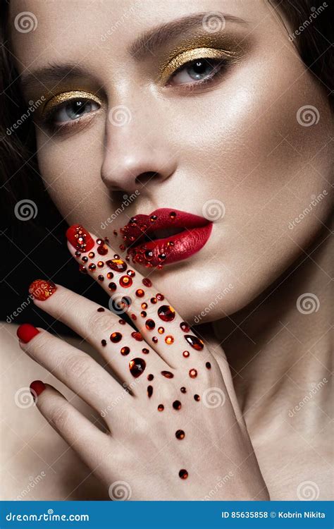 Beautiful Girl With Evening Make Up Red Lips In Rhinestones And Design Manicure Nails Beauty