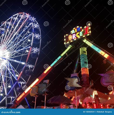 Ferris Wheel In Lights At Night Editorial Photo Image Of Fair