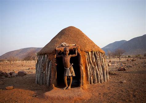 Himba Boy In The Entrance Of His Hut Okapale Namibia Vernacular