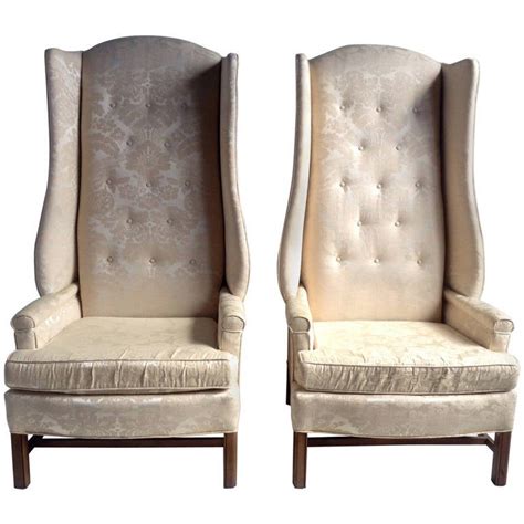 The frame is comprised of a steel tube and the arms are height adjustable. Monumental Oversized Stylized Wing Chairs Tall "Paris ...