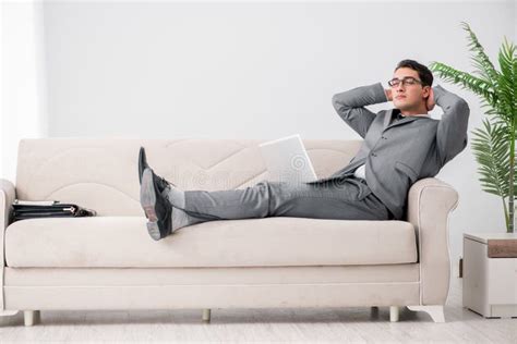 The Young Businessman Lying On The Sofa Stock Image Image Of Rest