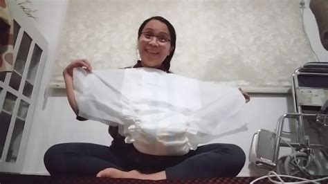How To Put On Tape Adult Diaper At Yourself While Laying Down Youtube