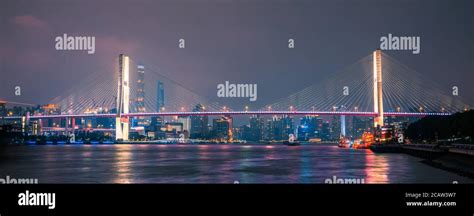 Night View Of Nanpu Bridge On Huangpu River In Shanghai China Stock