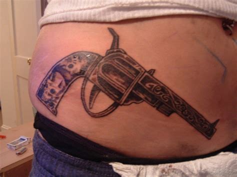 Gun tattoo design on thigh. 71 Stylish Gun Tattoos For Waist